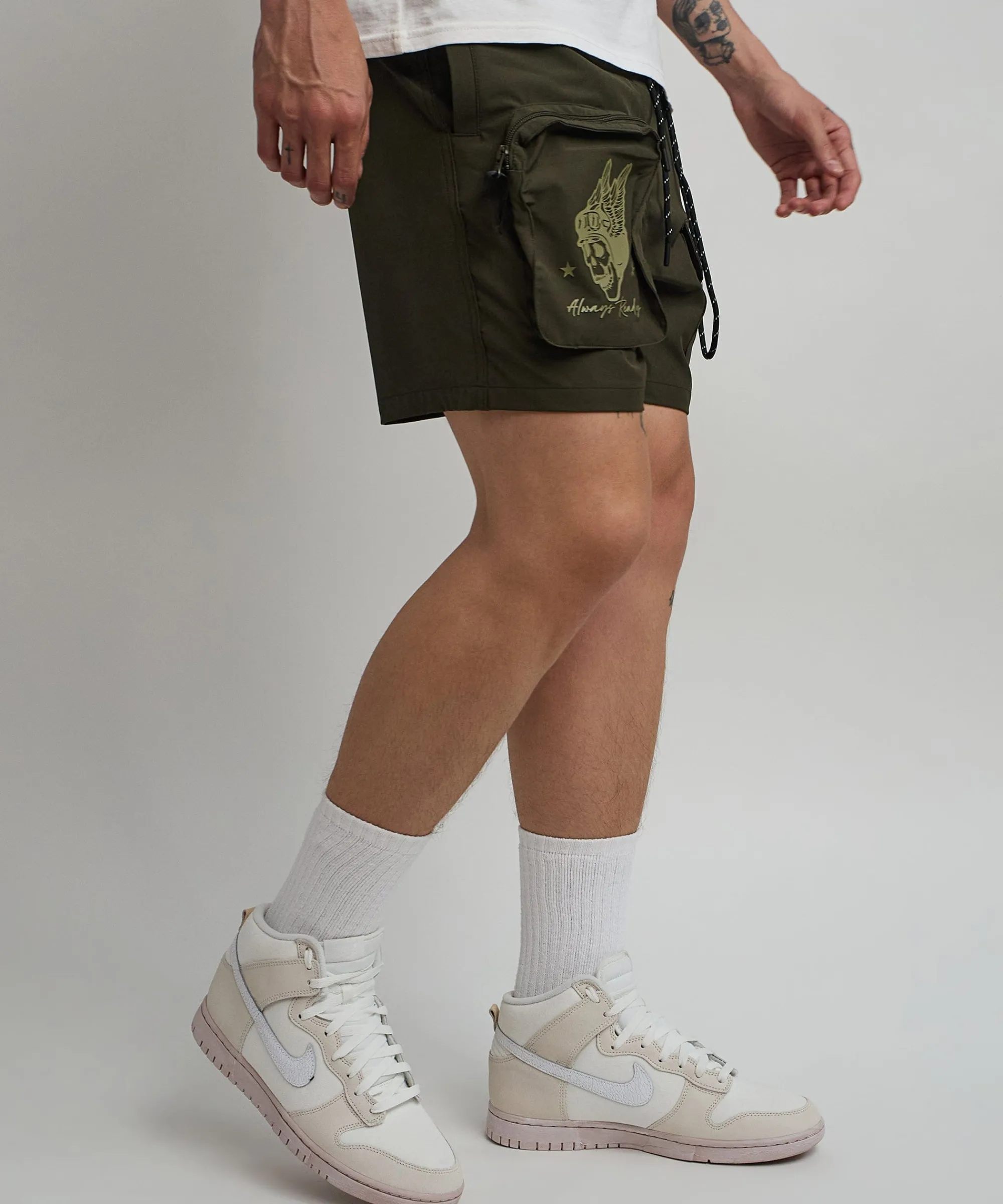 bridges_utility_cargo_stretch_tech_nylon_shorts__green_1.webp Sale Bridges Utility Cargo Stretch Tech Nylon Shorts - Green Shop All Bottoms | Shorts