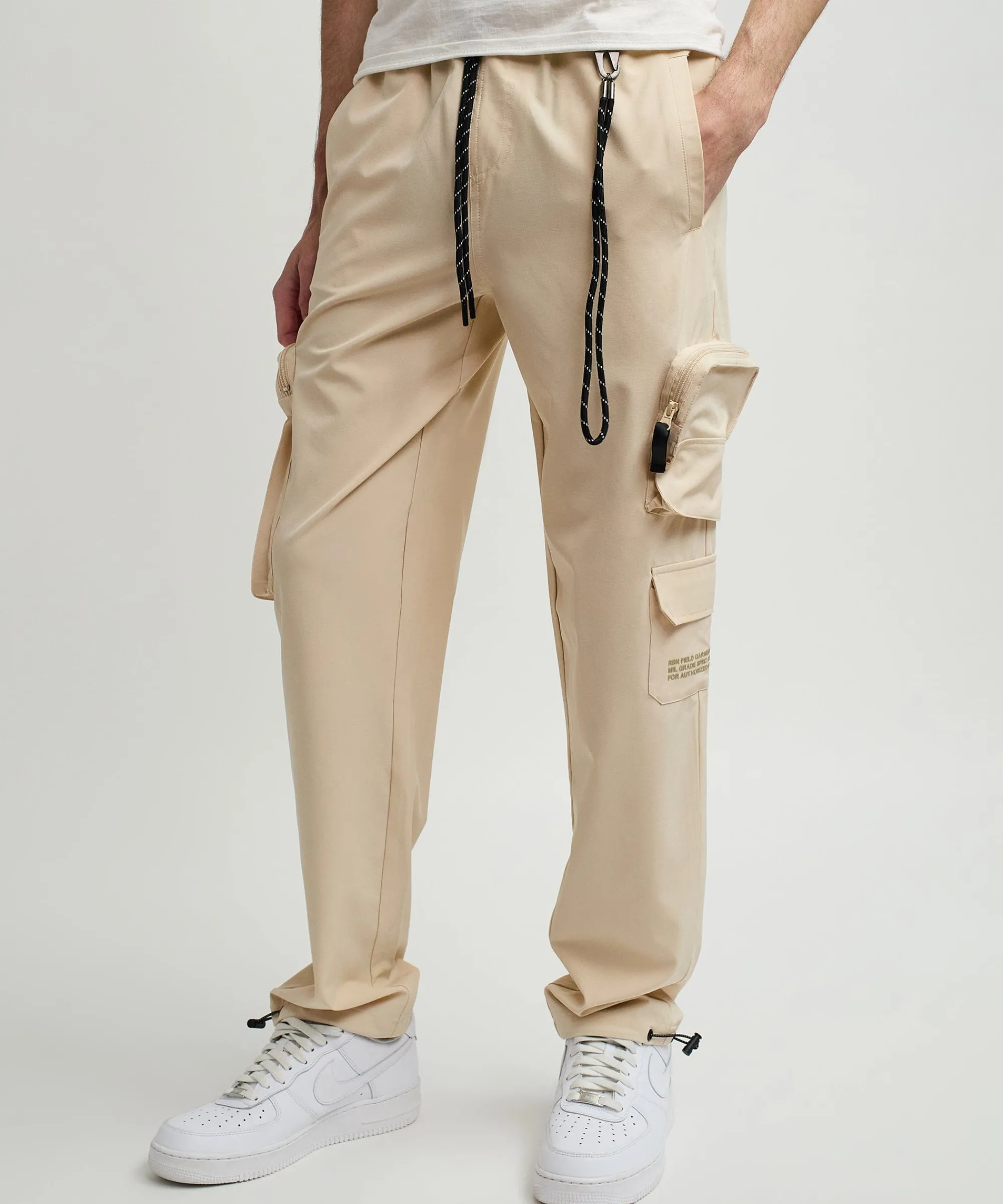 bridges_utility_stretch_tech_nylon_cargo_pants__cream_1.webp Store Bridges Utility Stretch Tech Nylon Cargo Pants - Cream Shop All Bottoms | Cargo & Utility Pants