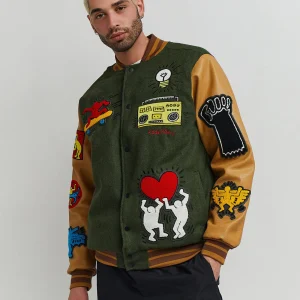 Shop Keith Haring Holding Hands Varsity Jacket Varsity Jackets