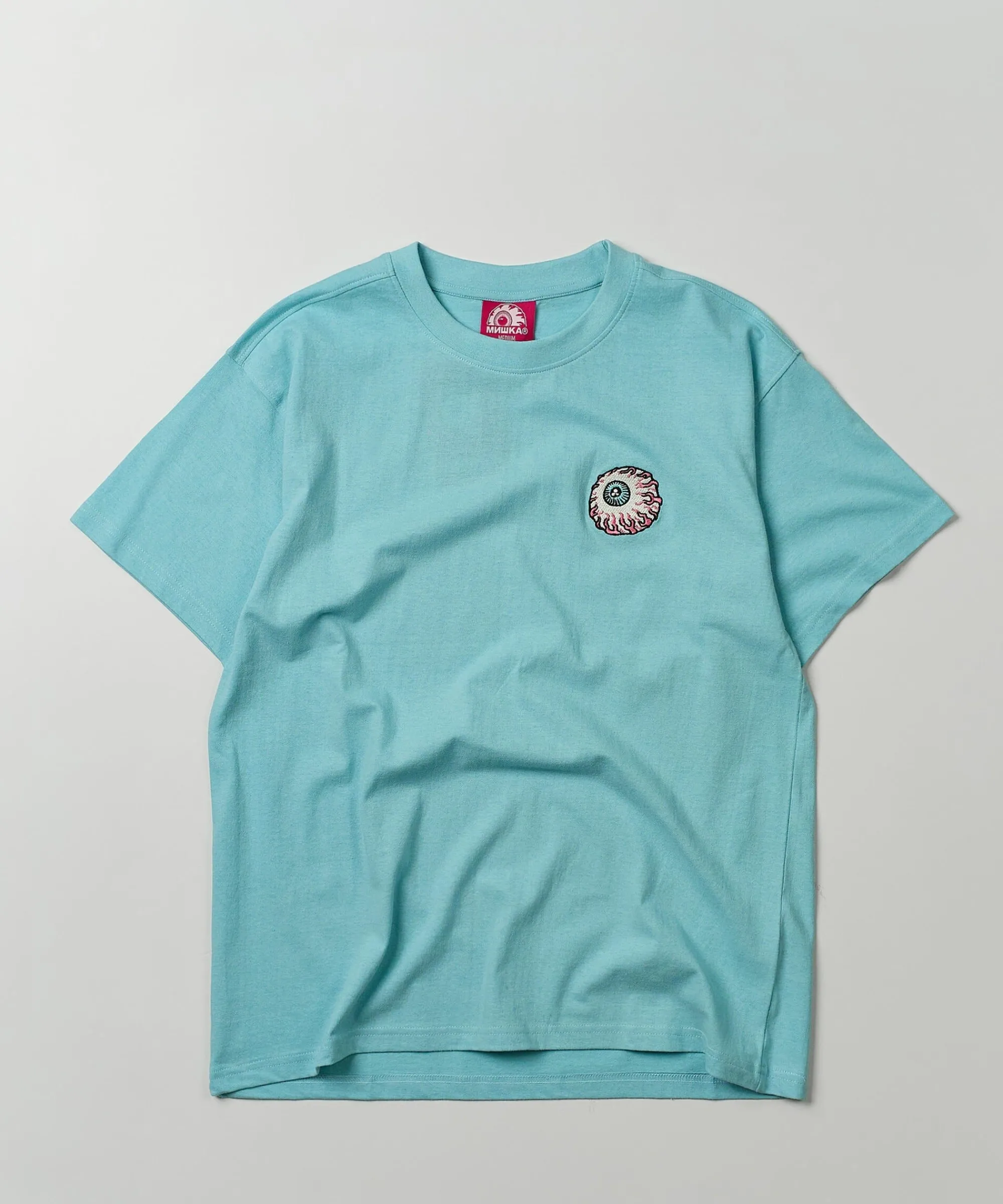 mishka_eyeball_embroidered_short_sleeve_tee__light_blue_0.webp Discount Mishka Eyeball Embroidered Short Sleeve Tee - Light Blue Graphic Tees
